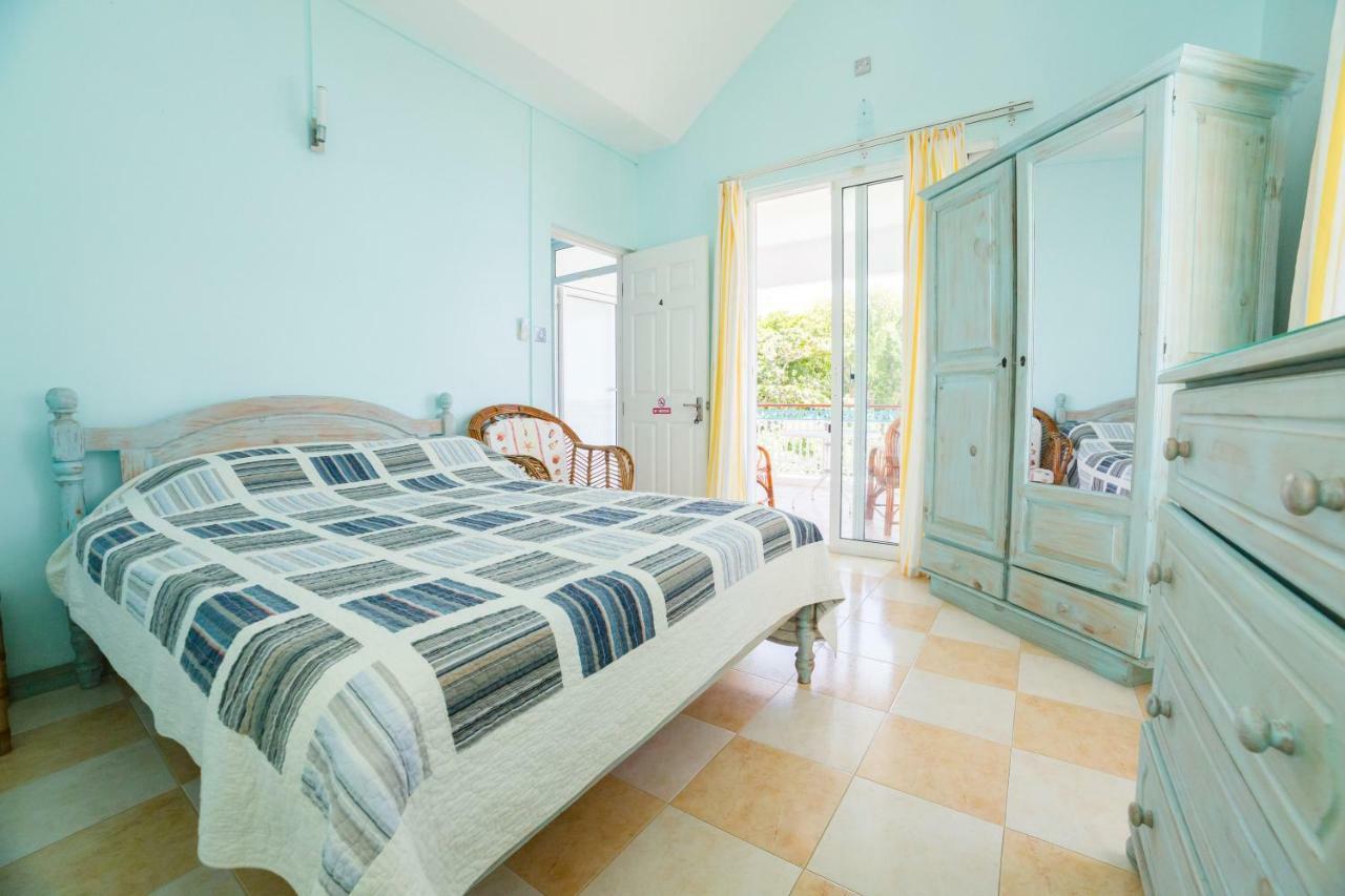Villa Bella Charming Beachfront Guesthouse Blue Bay Extérieur photo